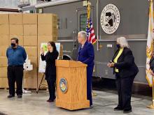 From left: Commissioner Frank Aguilar, ASL interpreter, President Preckwinkle and Commissioner Deborah Sims at the press conference on Oct. 1, 2020.